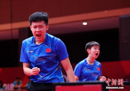 資料圖：雅加達亞運會，王楚欽/孫穎莎奪得混雙冠軍。 <a target='_blank' href='/'>中新社</a>記者 劉關關 攝