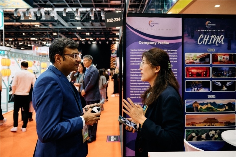 “中國(guó)館”展區(qū)現(xiàn)場(chǎng)洽談。 楊浩鵬攝