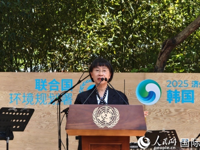 周國(guó)梅致辭。人民網(wǎng)記者 李明攝